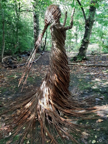 Lady in the woods,woodland garden, movement, sculpture, Essex weaver.