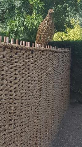 woven fence with pheasant addition